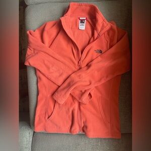 Coral North Face zip up, size M.
